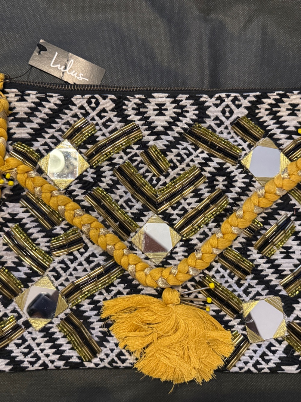 Lulu's Black & White Geometric Clutch with Mustard Tassel Trim